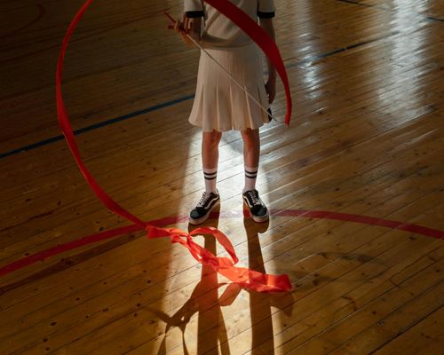 Person practicing rhythmic breathing and light movement
